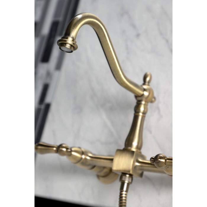 Kingston Heirloom KS1243ALBS - Heritage Two-Handle 3-Hole Wall Mount Bridge Kitchen Faucet with Brass Sprayer, Antique Brass