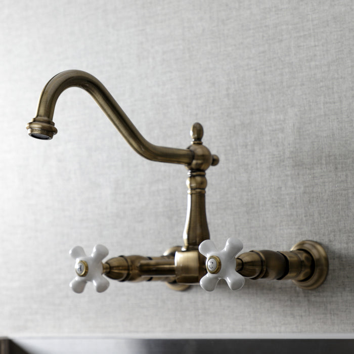 Kingston Heirloom KS1243PX - Heritage Two-Handle 2-Hole Wall Mount Bridge Kitchen Faucet, Antique Brass