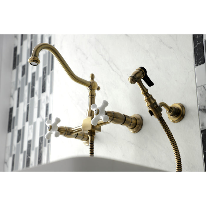 Kingston Heirloom KS1243PXBS - Heritage Two-Handle 3-Hole Wall Mount Bridge Kitchen Faucet with Brass Sprayer, Antique Brass