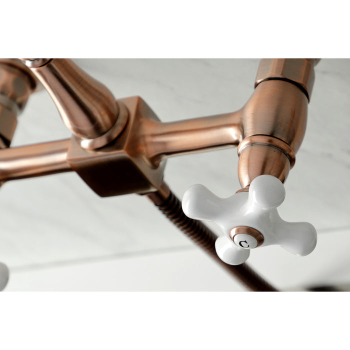 Kingston Heirloom KS124PXBSAC - Heritage Two-Handle 3-Hole Wall Mount Bridge Kitchen Faucet with Brass Sprayer, Antique Copper