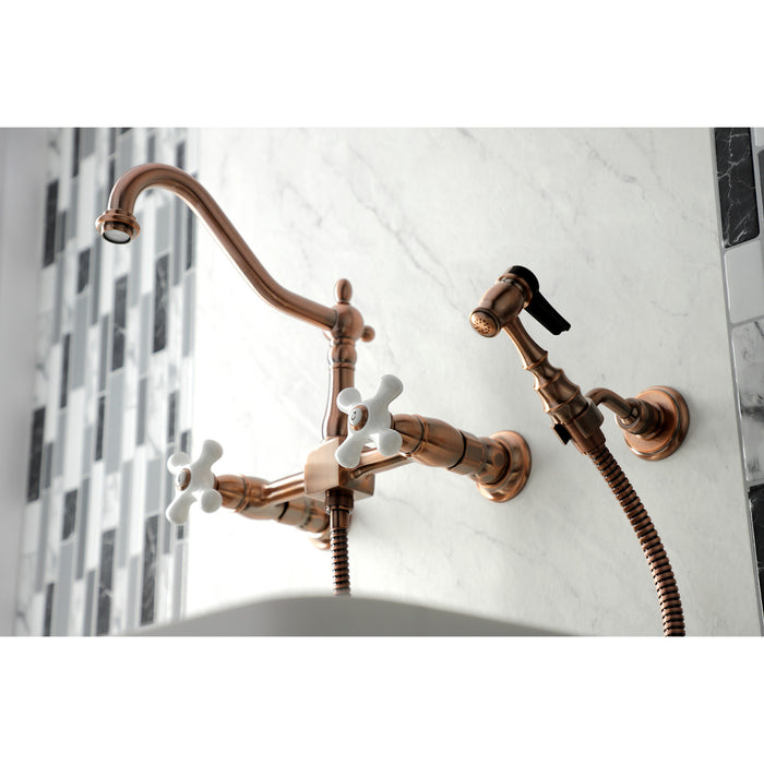 Kingston Heirloom KS124PXBSAC - Heritage Two-Handle 3-Hole Wall Mount Bridge Kitchen Faucet with Brass Sprayer, Antique Copper