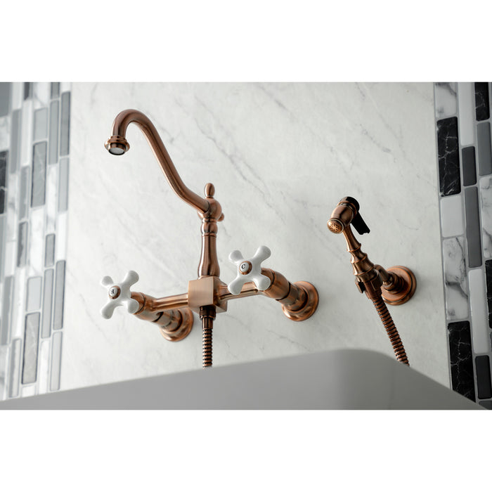 Kingston Heirloom KS124PXBSAC - Heritage Two-Handle 3-Hole Wall Mount Bridge Kitchen Faucet with Brass Sprayer, Antique Copper