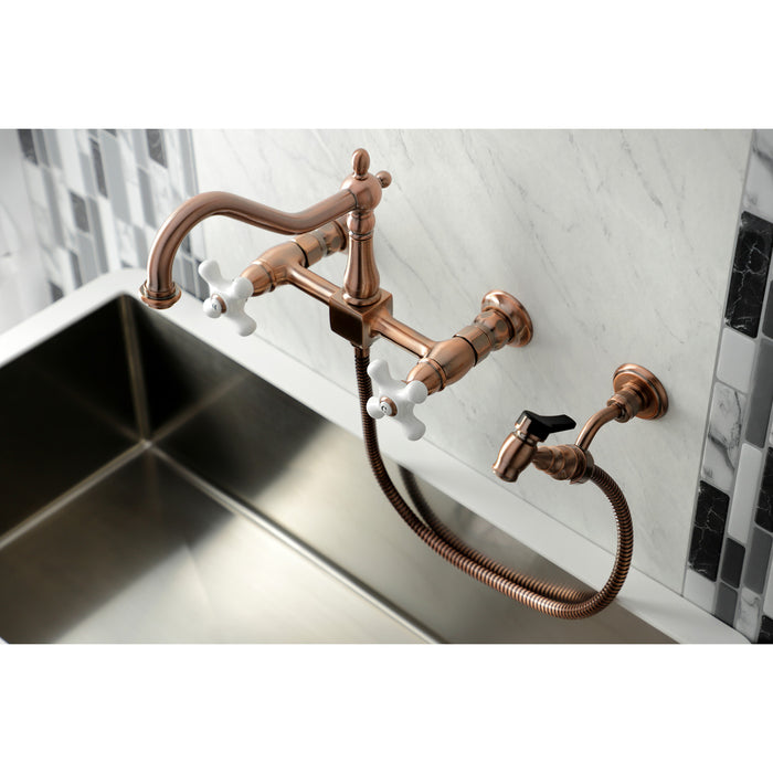 Kingston Heirloom KS124PXBSAC - Heritage Two-Handle 3-Hole Wall Mount Bridge Kitchen Faucet with Brass Sprayer, Antique Copper
