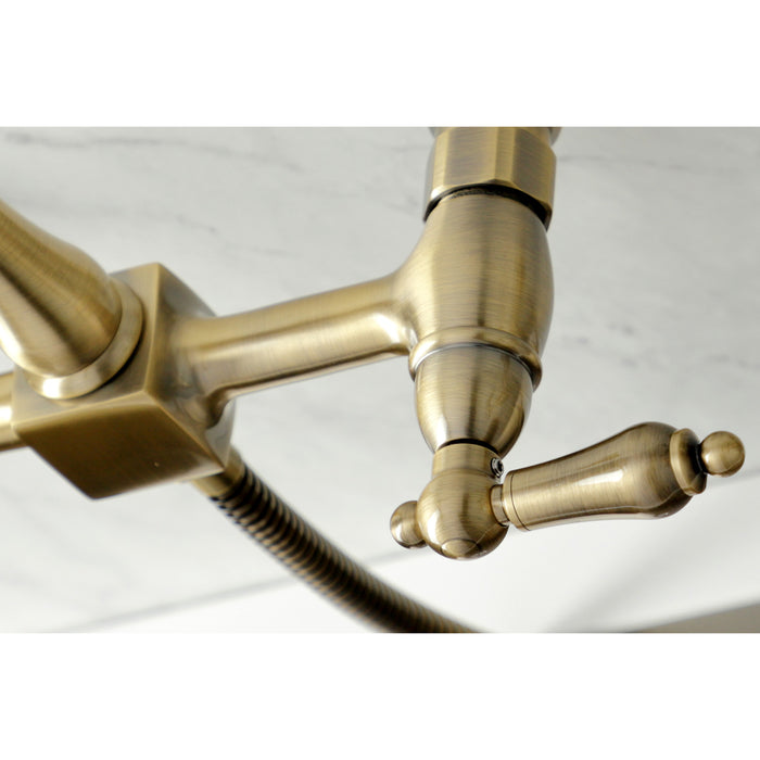 Kingston Heirloom KS1263ALBS - Heritage Two-Handle 3-Hole Wall Mount Bridge Kitchen Faucet with Brass Sprayer, Antique Brass