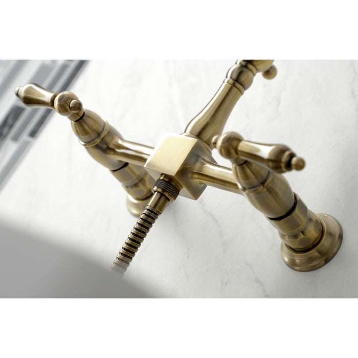 Kingston Heirloom KS1263ALBS - Heritage Two-Handle 3-Hole Wall Mount Bridge Kitchen Faucet with Brass Sprayer, Antique Brass
