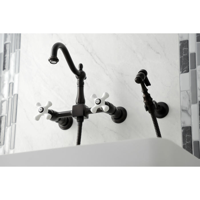Kingston Heirloom KS1265PXBS - Heritage Two-Handle 3-Hole Wall Mount Bridge Kitchen Faucet with Brass Sprayer, Oil Rubbed Bronze