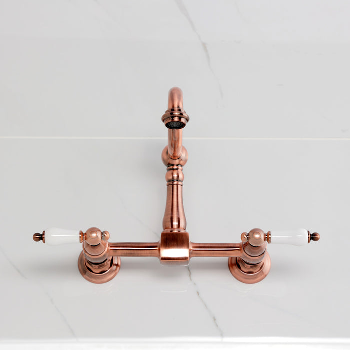 Kingston Heirloom KS126PLAC - Heritage Two-Handle 2-Hole Wall Mount Bridge Kitchen Faucet, Antique Copper