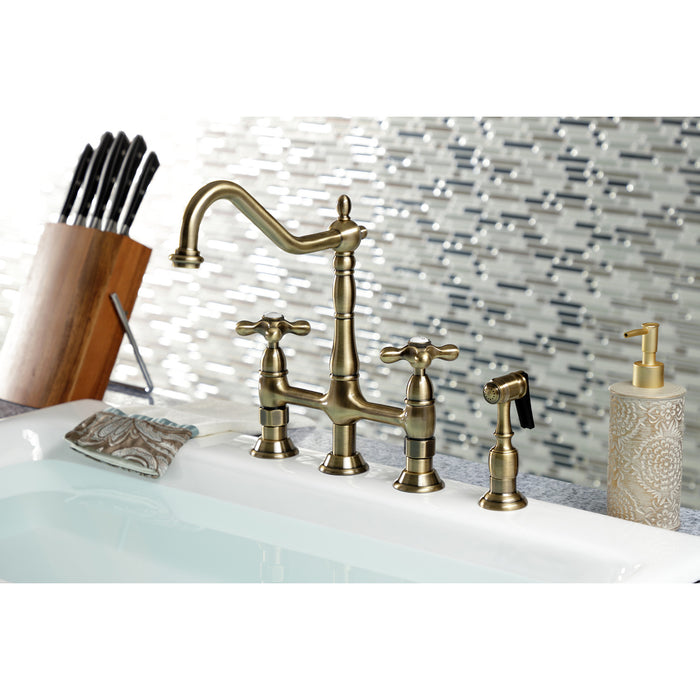 Kingston Heirloom KS1273AXBS - Heritage Two-Handle 4-Hole Deck Mount Bridge Kitchen Faucet with Brass Sprayer, Antique Brass