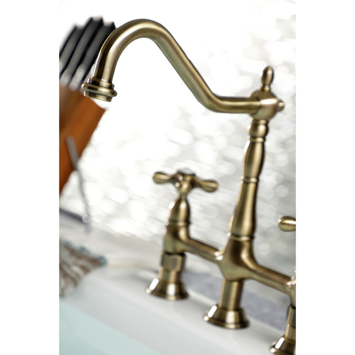 Kingston Heirloom KS1273AXBS - Heritage Two-Handle 4-Hole Deck Mount Bridge Kitchen Faucet with Brass Sprayer, Antique Brass