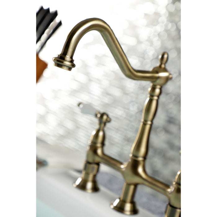 Kingston Heirloom KS1273PLBS - Heritage Two-Handle 4-Hole Deck Mount Bridge Kitchen Faucet with Brass Sprayer, Antique Brass