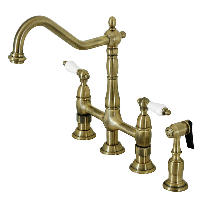 Kingston Heirloom KS1273PLBS - Heritage Two-Handle 4-Hole Deck Mount Bridge Kitchen Faucet with Brass Sprayer, Antique Brass