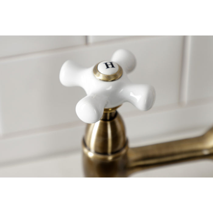 Kingston Heirloom KS1273PXBS - Heritage Two-Handle 4-Hole Deck Mount Bridge Kitchen Faucet with Brass Sprayer, Antique Brass
