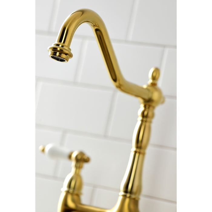 Kingston Heirloom KS1277PLBS - Heritage Two-Handle 4-Hole Deck Mount Bridge Kitchen Faucet with Brass Sprayer, Brushed Brass