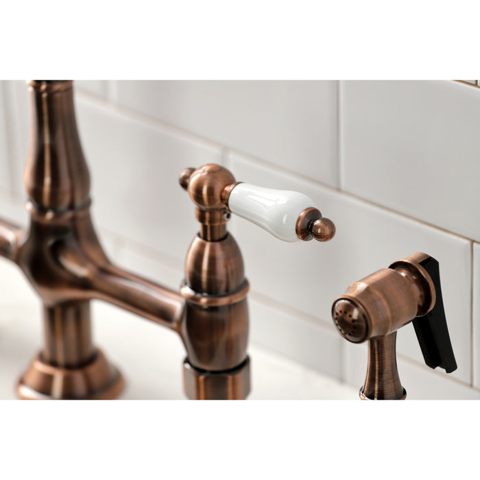 Kingston Heirloom KS127PLBSAC - Heritage Two-Handle 4-Hole Deck Mount Bridge Kitchen Faucet with Brass Sprayer, Antique Copper