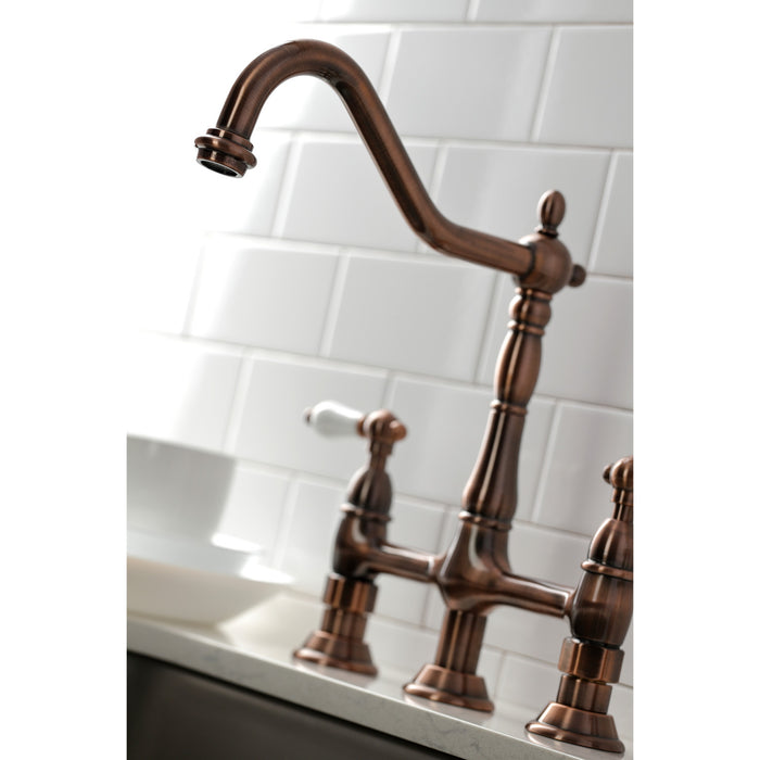 Kingston Heirloom KS127PLBSAC - Heritage Two-Handle 4-Hole Deck Mount Bridge Kitchen Faucet with Brass Sprayer, Antique Copper