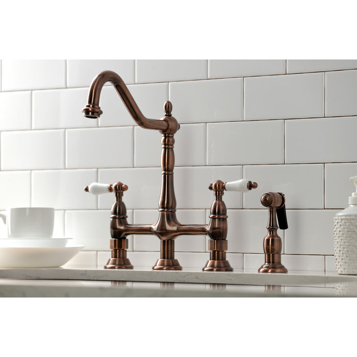 Kingston Heirloom KS127PLBSAC - Heritage Two-Handle 4-Hole Deck Mount Bridge Kitchen Faucet with Brass Sprayer, Antique Copper