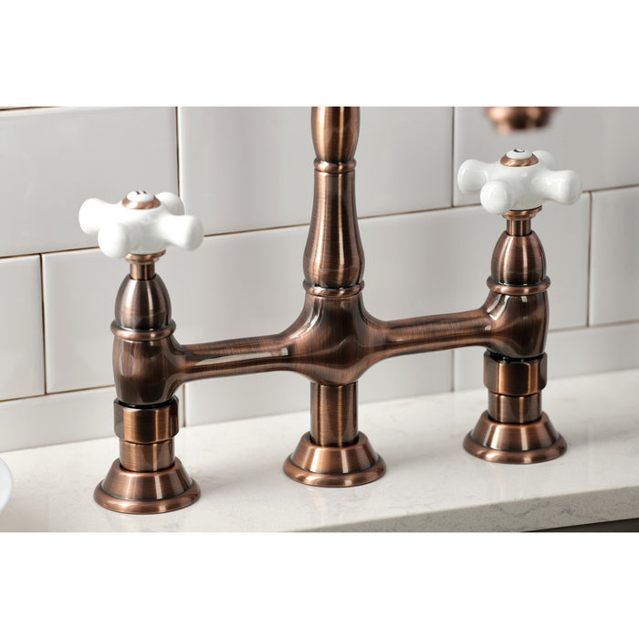 Kingston Heirloom KS127PXBSAC - Heritage Two-Handle 4-Hole Deck Mount Bridge Kitchen Faucet with Brass Sprayer, Antique Copper