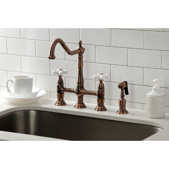 Kingston Heirloom KS127PXBSAC - Heritage Two-Handle 4-Hole Deck Mount Bridge Kitchen Faucet with Brass Sprayer, Antique Copper