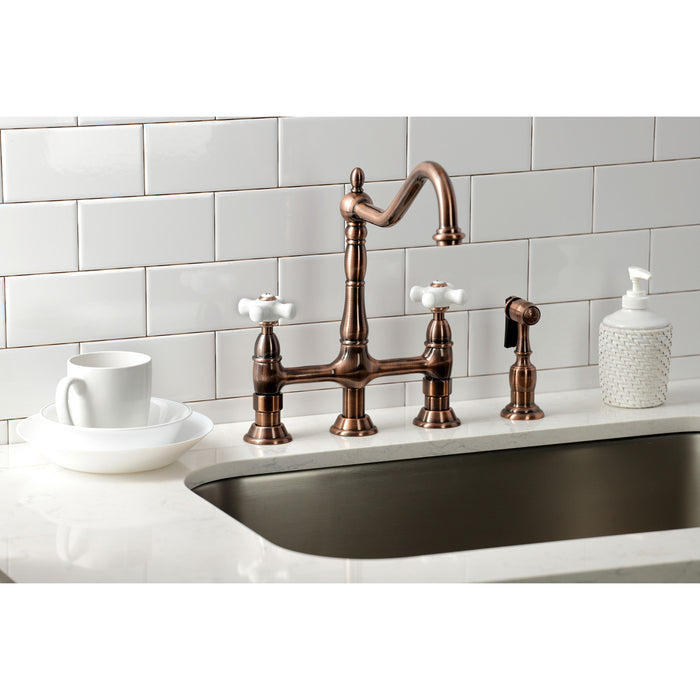 Kingston Heirloom KS127PXBSAC - Heritage Two-Handle 4-Hole Deck Mount Bridge Kitchen Faucet with Brass Sprayer, Antique Copper