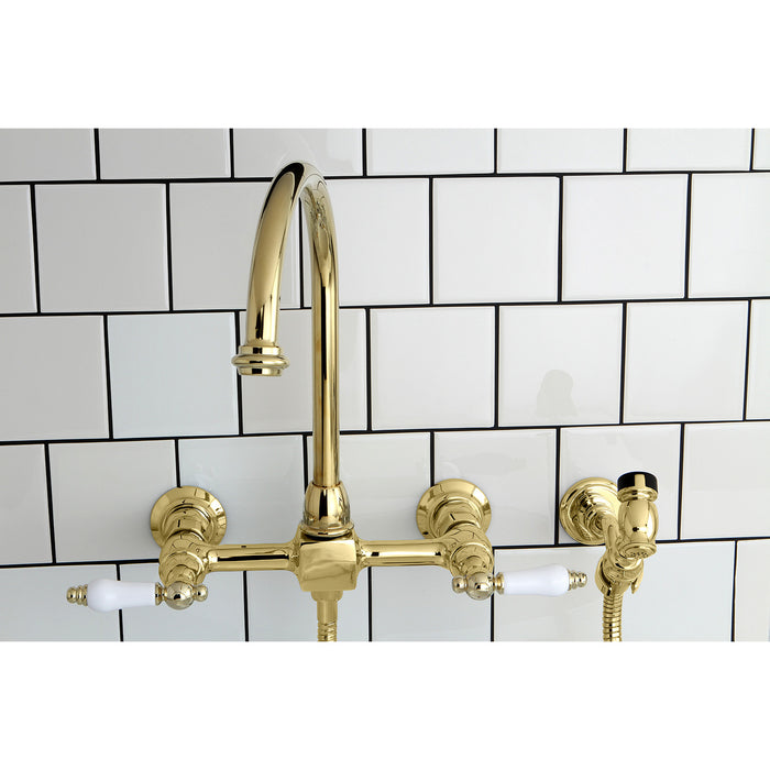 Kingston Tulare KS1292PLBS - Restoration Two-Handle 3-Hole Wall Mount Bridge Kitchen Faucet with Brass Sprayer, Polished Brass