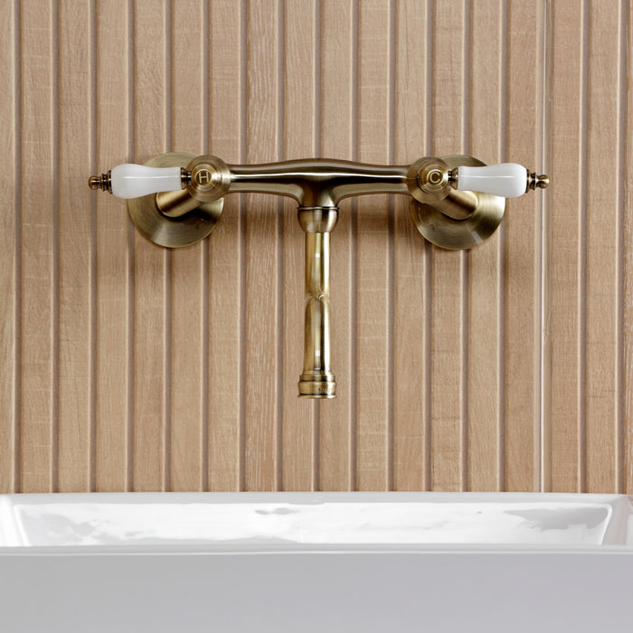 Kingston Heirloom KS2113PL - Kingston Double-Handle 2-Hole Wall Mount Bathroom Faucet, Antique Brass