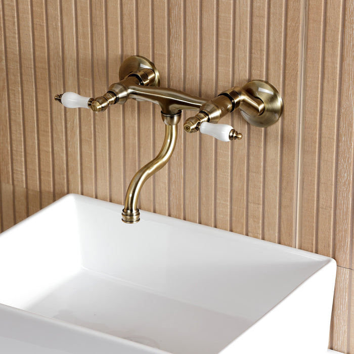 Kingston Heirloom KS2113PL - Kingston Double-Handle 2-Hole Wall Mount Bathroom Faucet, Antique Brass