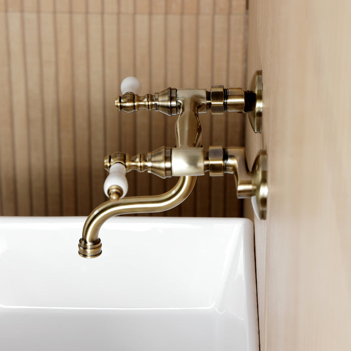 Kingston Heirloom KS2113PL - Kingston Double-Handle 2-Hole Wall Mount Bathroom Faucet, Antique Brass