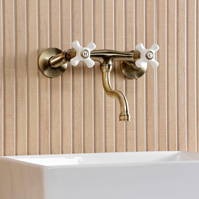 Kingston Heirloom KS2113PX - Kingston Double-Handle 2-Hole Wall Mount Bathroom Faucet, Antique Brass