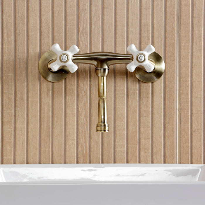 Kingston Heirloom KS2113PX - Kingston Double-Handle 2-Hole Wall Mount Bathroom Faucet, Antique Brass
