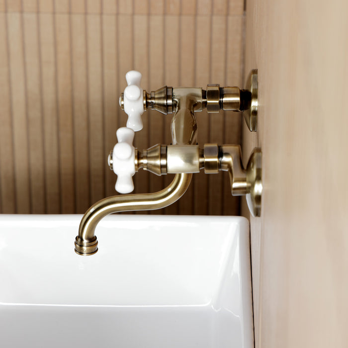 Kingston Heirloom KS2113PX - Kingston Double-Handle 2-Hole Wall Mount Bathroom Faucet, Antique Brass