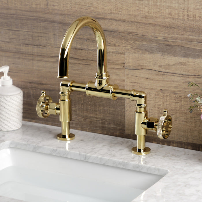 Kingston Sona KS2172RKX - Webb Two-Handle 2-Hole Deck Mount Bridge Bathroom Faucet with Knurled Handle and Push Pop-Up Drain, Polished Brass
