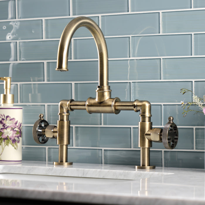 Kingston Sona KS2173RKX - Webb Two-Handle 2-Hole Deck Mount Bridge Bathroom Faucet with Knurled Handle and Push Pop-Up Drain, Antique Brass