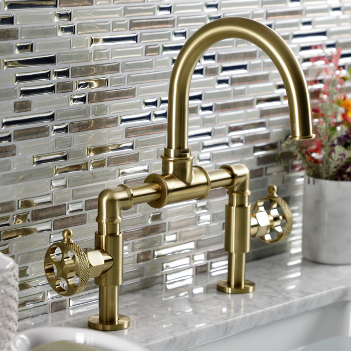 Kingston Sona KS2177RKX - Webb Two-Handle 2-Hole Deck Mount Bridge Bathroom Faucet with Knurled Handle and Push Pop-Up Drain, Brushed Brass