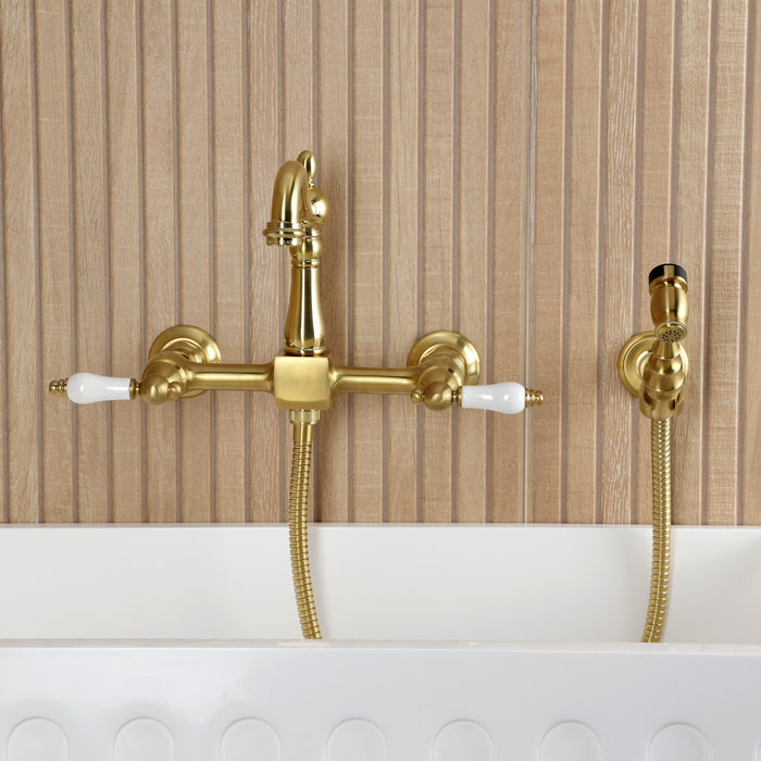 Kingston Heirloom KS2447PLBS - Heritage Two-Handle 3-Hole Wall Mount Bridge Kitchen Faucet with Brass Sprayer, Brushed Brass