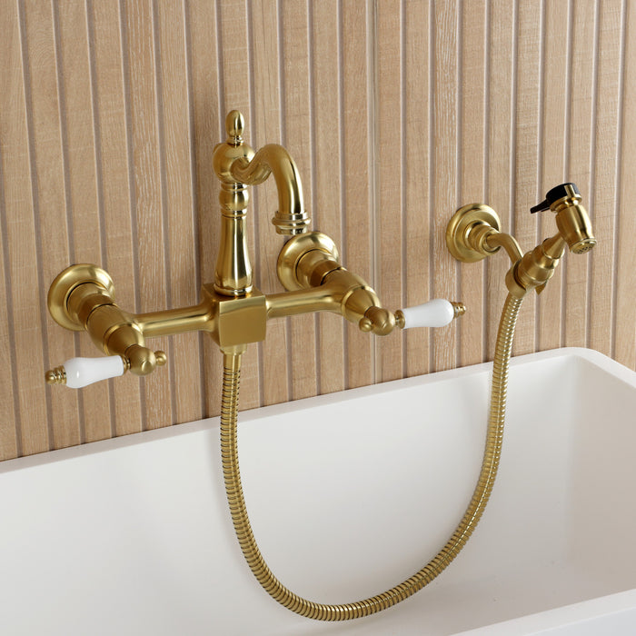 Kingston Heirloom KS2447PLBS - Heritage Two-Handle 3-Hole Wall Mount Bridge Kitchen Faucet with Brass Sprayer, Brushed Brass