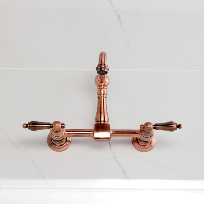 Kingston Heirloom KS244ALAC - Heritage Two-Handle 2-Hole Wall Mount Bridge Kitchen Faucet, Antique Copper