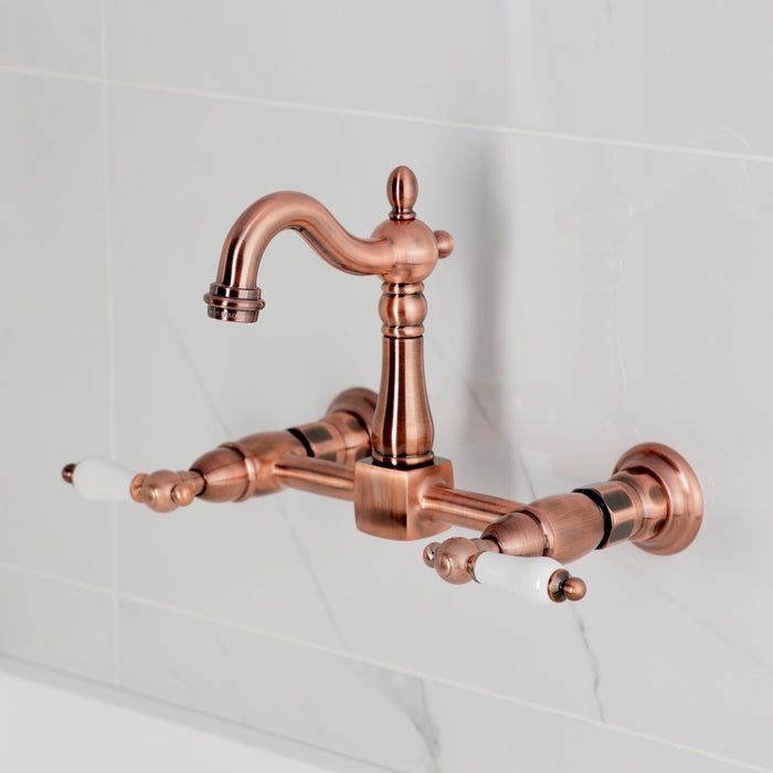Kingston Heirloom KS244PLAC - Heritage Two-Handle 2-Hole Wall Mount Bridge Kitchen Faucet, Antique Copper