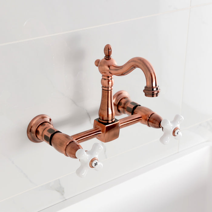Kingston Heirloom KS244PXAC - Heritage Two-Handle 2-Hole Wall Mount Bridge Kitchen Faucet, Antique Copper