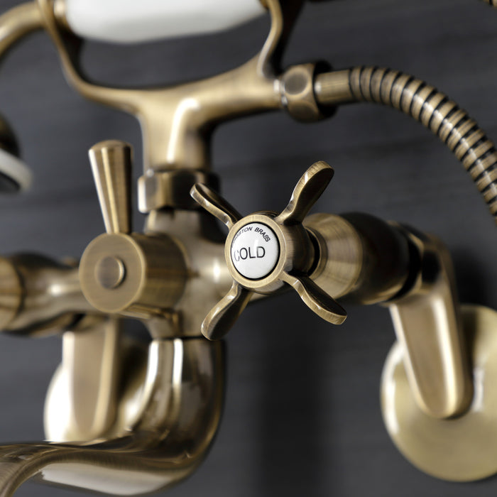 Kingston Heirloom KS246AB - Essex Three-Handle 2-Hole Wall Mount Clawfoot Tub Faucet with Handshower, Antique Brass