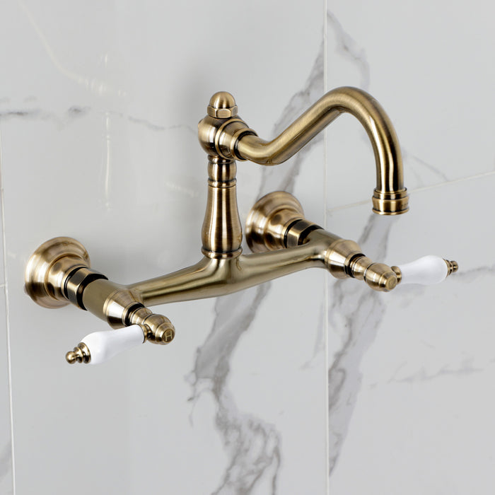 Kingston Heirloom KS3243PL - Vintage Double-Handle 2-Hole Wall Mount Bathroom Faucet, Antique Brass