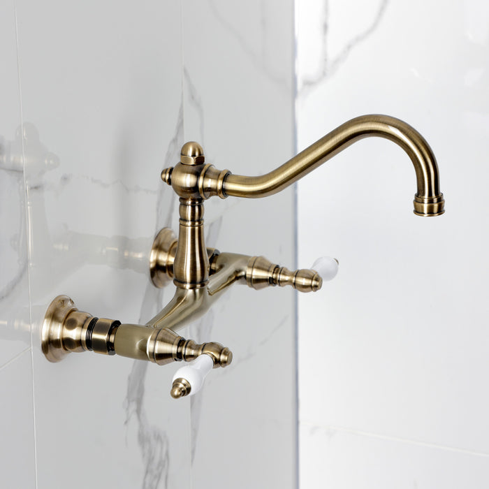Kingston Heirloom KS3243PL - Vintage Double-Handle 2-Hole Wall Mount Bathroom Faucet, Antique Brass