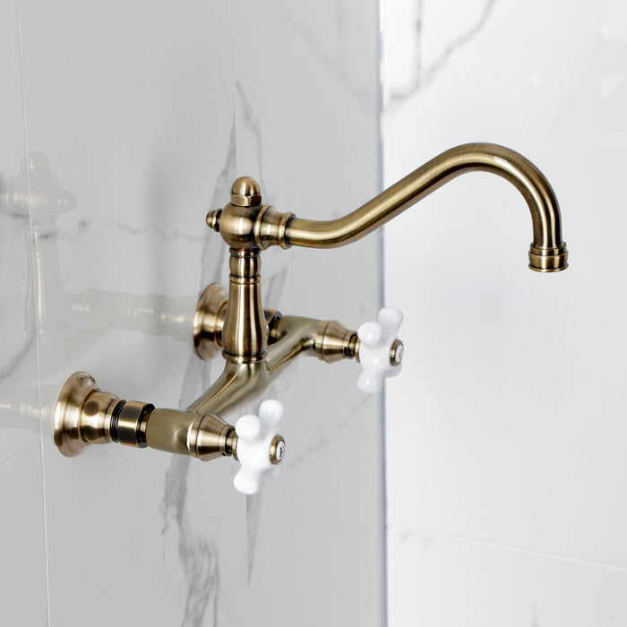 Kingston Heirloom KS3243PX - Vintage Double-Handle 2-Hole Wall Mount Bathroom Faucet, Antique Brass