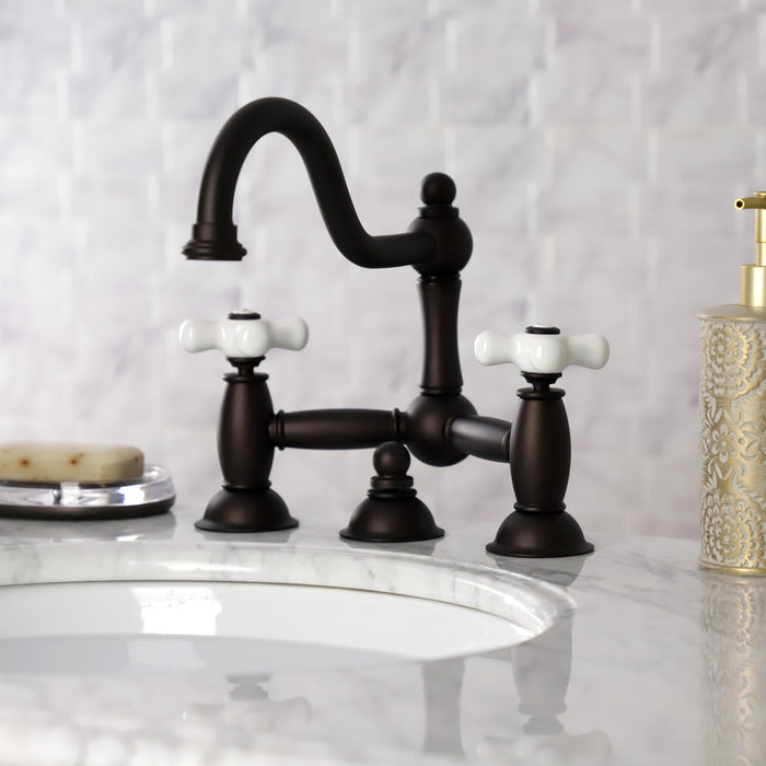 Kingston Heirloom KS3915PX - Restoration Two-Handle 3-Hole Deck Mount Bridge Bathroom Faucet with Brass Pop-Up, Oil Rubbed Bronze