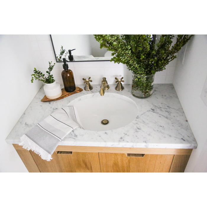 Kingston Tulare KS4463BEX - Essex Two-Handle 3-Hole Deck Mount Widespread Bathroom Faucet with Brass Pop-Up, Antique Brass