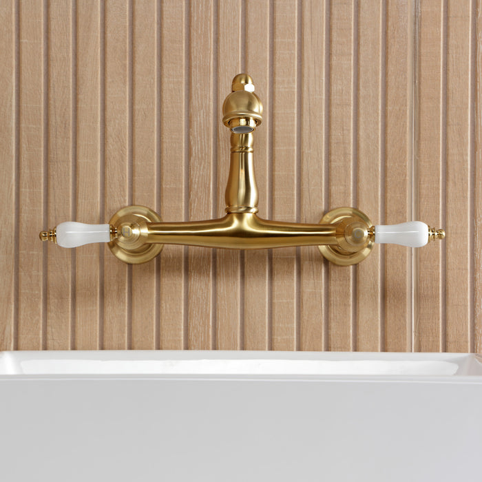 Kingston Heirloom KS7257PL - English Country Double-Handle 2-Hole Wall Mount Bathroom Faucet, Brushed Brass