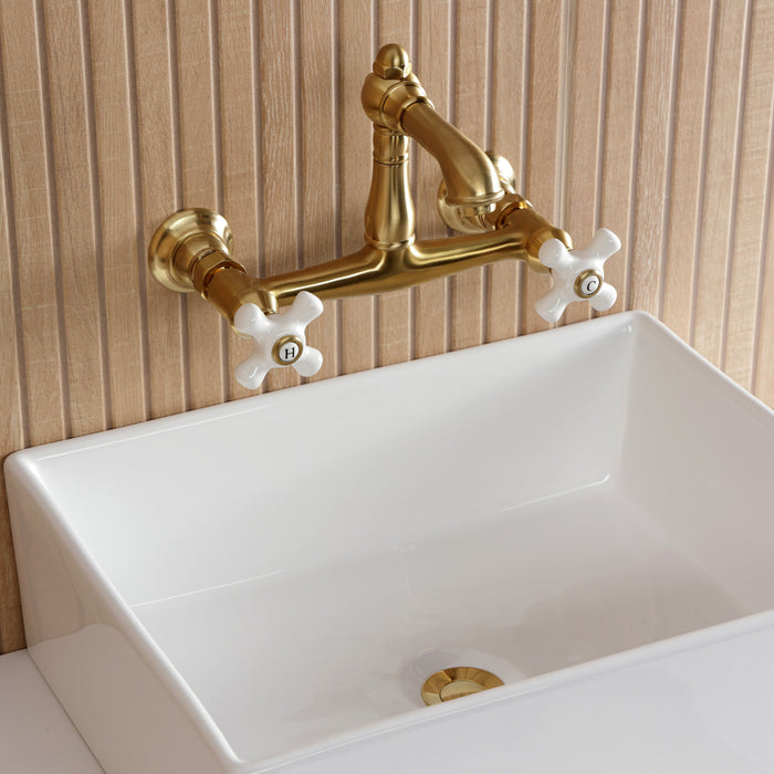 Kingston Heirloom KS7257PX - English Country Double-Handle 2-Hole Wall Mount Bathroom Faucet, Brushed Brass