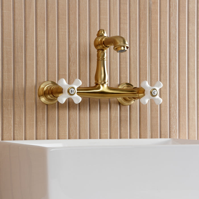 Kingston Heirloom KS7257PX - English Country Double-Handle 2-Hole Wall Mount Bathroom Faucet, Brushed Brass