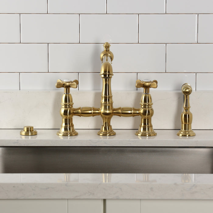 Kingston Tulare KS7277BEXBS - Essex Two-Handle 4-Hole Deck Mount Bridge Kitchen Faucet with Brass Sprayer, Brushed Brass