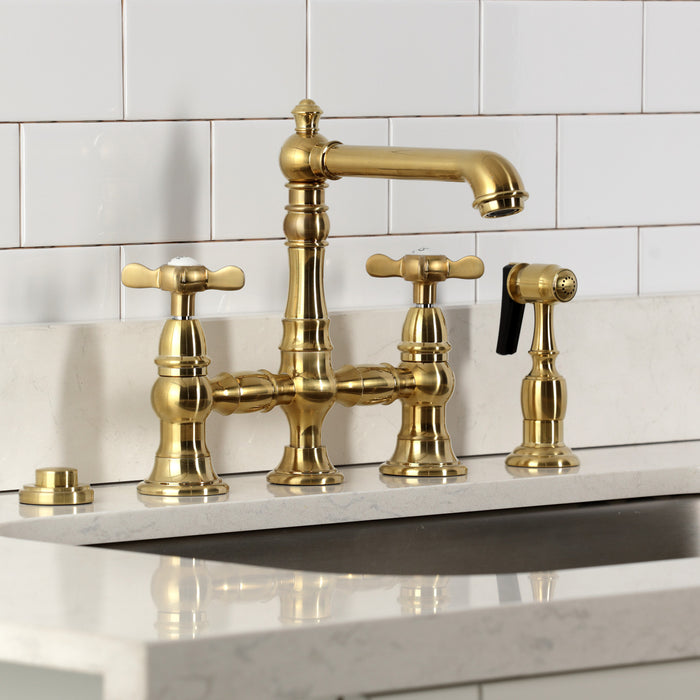 Kingston Tulare KS7277BEXBS - Essex Two-Handle 4-Hole Deck Mount Bridge Kitchen Faucet with Brass Sprayer, Brushed Brass