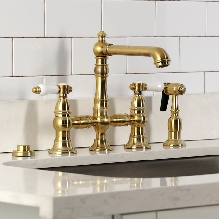 Kingston Tulare KS7277BPLBS - Bel-Air Two-Handle 4-Hole Deck Mount Bridge Kitchen Faucet with Brass Sprayer, Brushed Brass